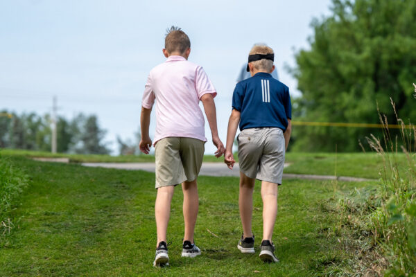 Young fans walk around the course during The Pinnacle Bank Championship
