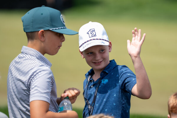 A young fan waves during The Pinnacle Bank Championship