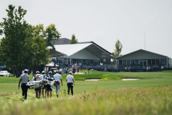 Golfers advance to their next shot during the Pinnacle Bank Championship