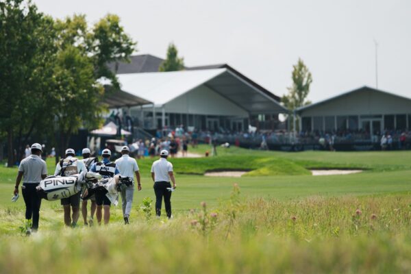 Group of golfers walking together
